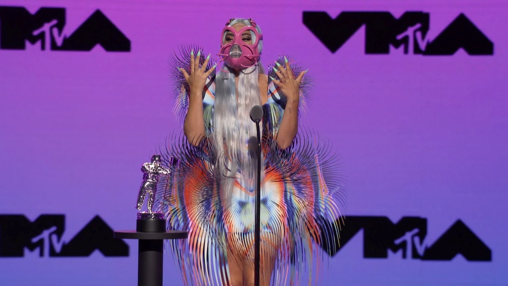 Lady Gaga accepts the award for Best Collaboration for 